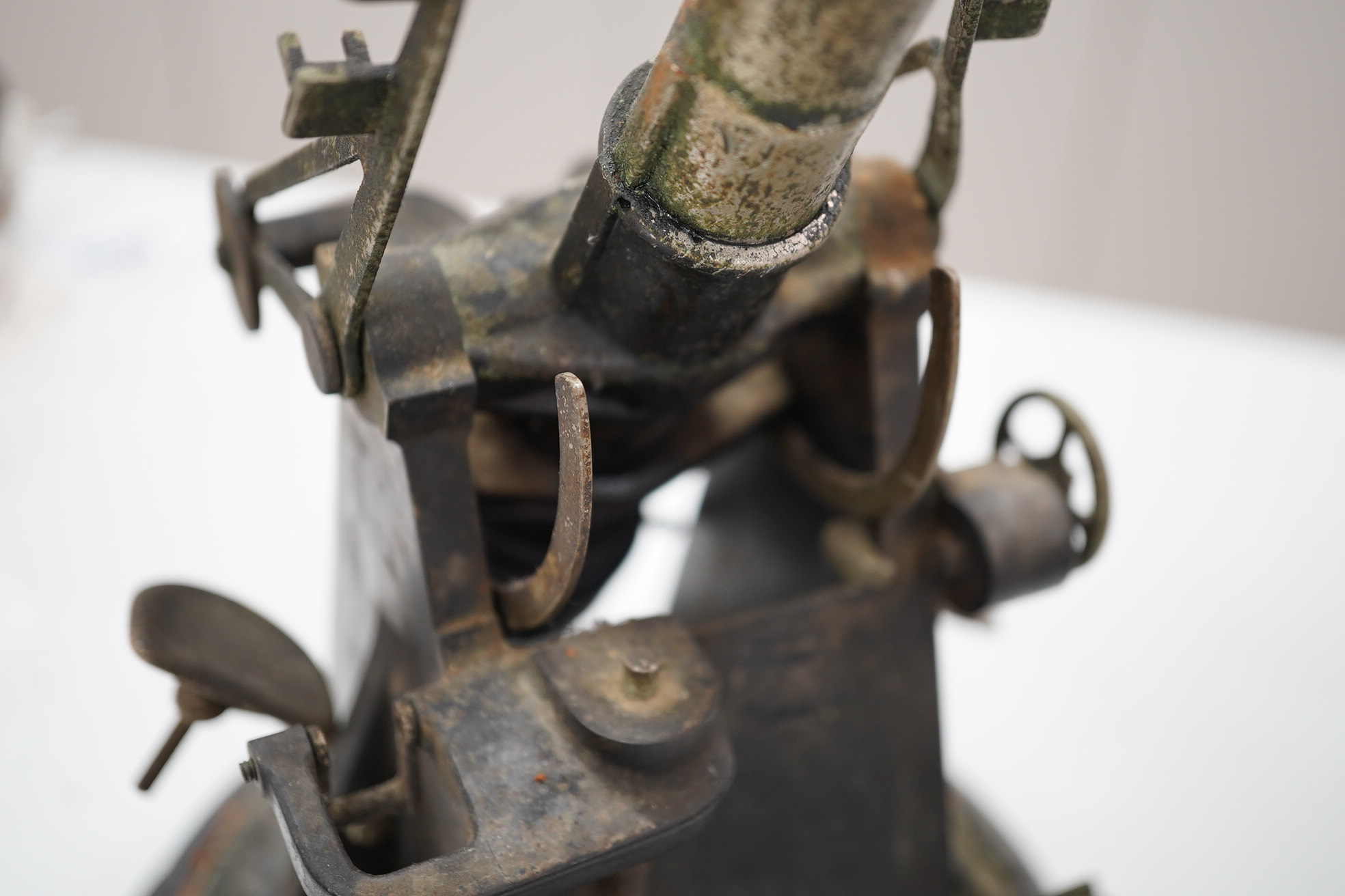 A steel model of a First World War 4 inch mark IX E.O.C. anti-aircraft gun, barrel 18cm, on a turned ebonised pine base with applied label. Condition - fair, some wear overall.